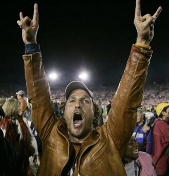 matthew-mcconaughey-hook-em-horns.jpg